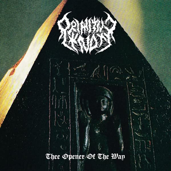 Dark album cover with carved stone face and band logo, āPrimitive Knotā.
