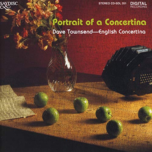 CD cover: concertina, vase of flowers, green apples on a wooden table.