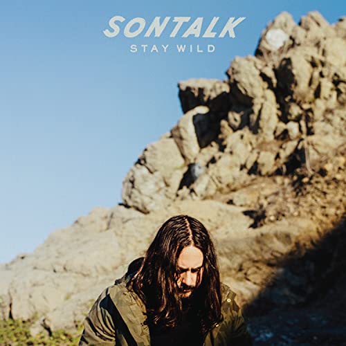 Album cover for Sontalk’s “Stay Wild” featuring a man and mountains.