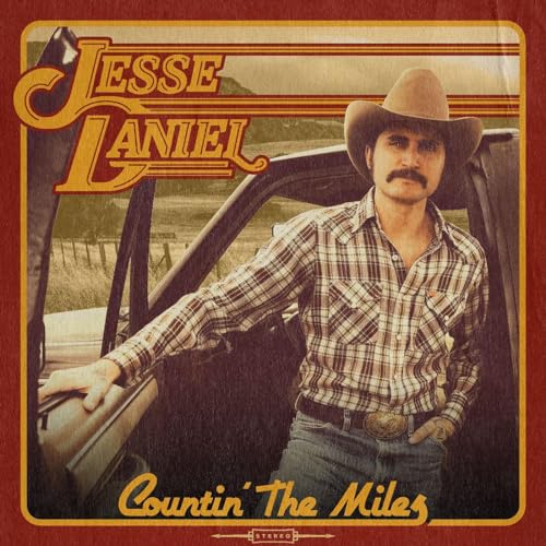 CD cover featuring a man in a cowboy hat leaning on a car.
