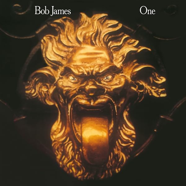 Bob James’ “One” vinyl album cover featuring a golden, roaring face.