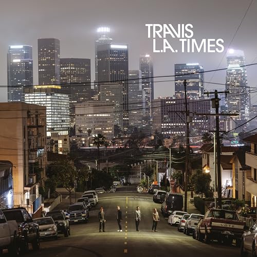 Album cover: Travis – L.A. Times, featuring a city skyline and street scene.