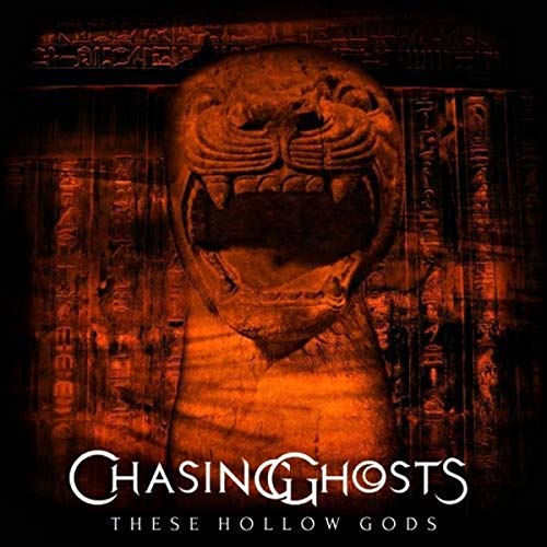 CD cover: stone mask with open mouth, dark and orange tones.