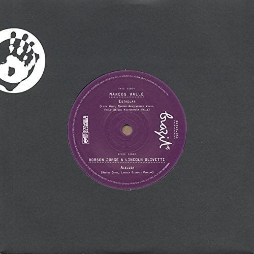 Purple and gold 7-inch vinyl record label with text and logos.