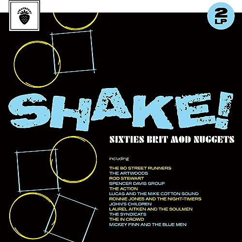 Album cover with black background, blue text reading SHAKE! and a list of artists.