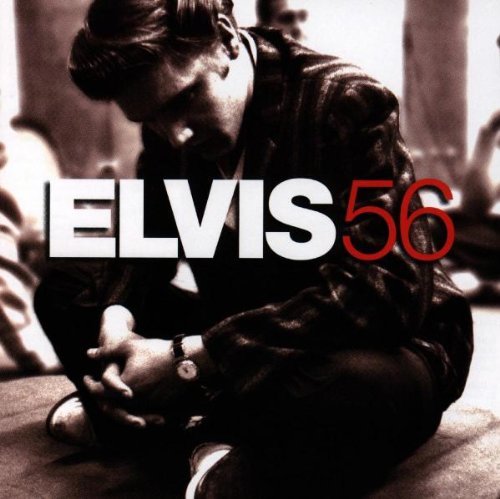 Sepia-toned photo of Elvis Presley seated, with "Elvis 56" text overlay.