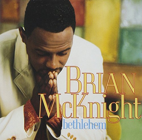 CD cover featuring Brian McKnight in a suit, looking downward.