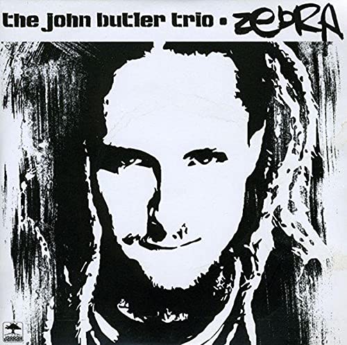 CD cover for John Butler Trio’s “Zebra” featuring a stark portrait.