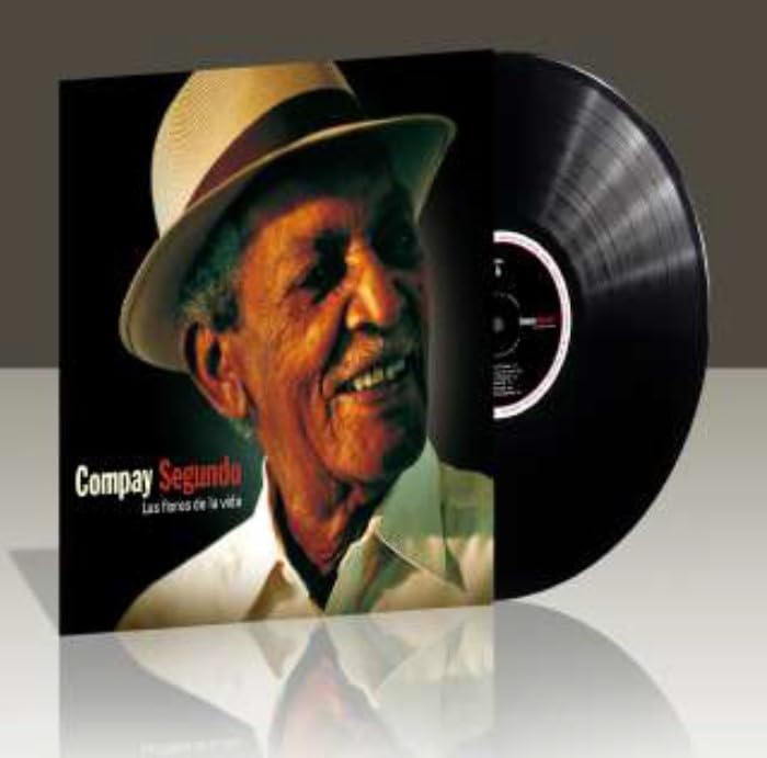 Vinyl record of Compay Segundo with a portrait of the artist.