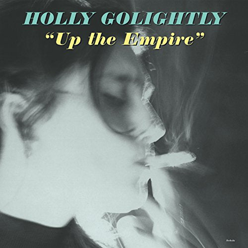 CD cover for Holly Golightly’s “Up the Empire” featuring a smoky portrait.