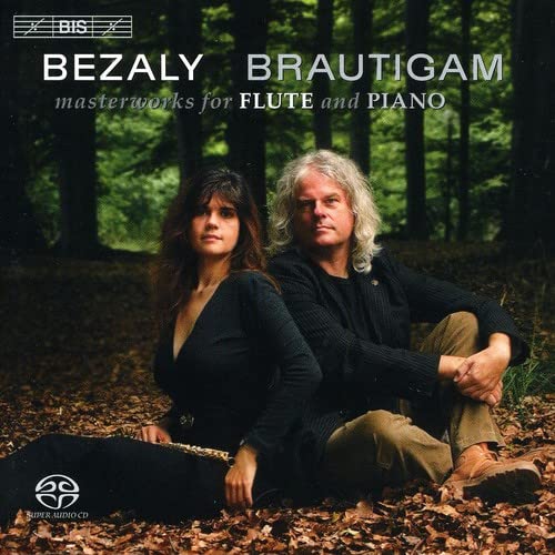 CD cover featuring a woman and man seated amongst autumn leaves.