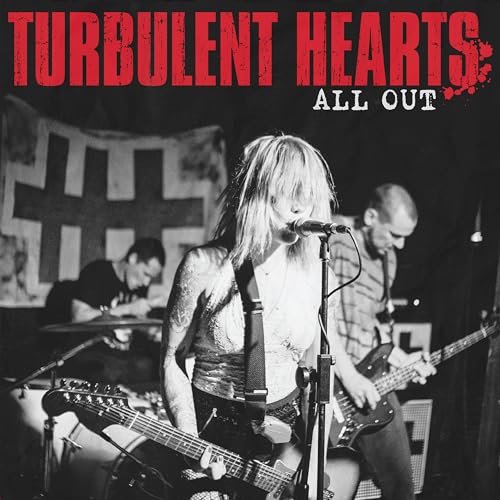 Black and white album cover featuring a band performing onstage.