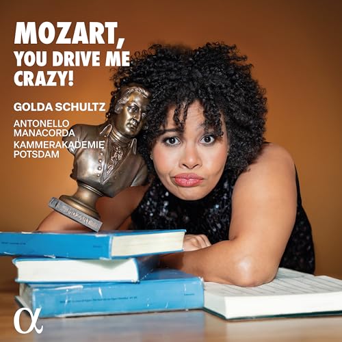 CD cover featuring Golda Schultz and a Mozart bust on books.