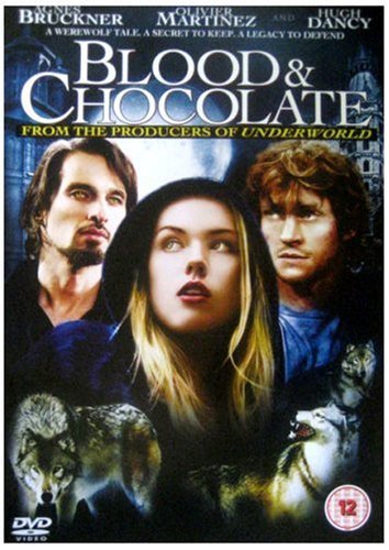 DVD cover for "Blood and Chocolate" featuring three people and wolves.