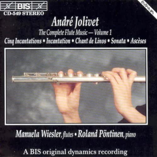 CD cover featuring hands playing a silver flute against a dark background.