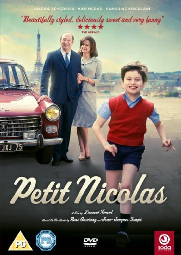 A young boy runs in front of his parents and a car near the Eiffel Tower.
