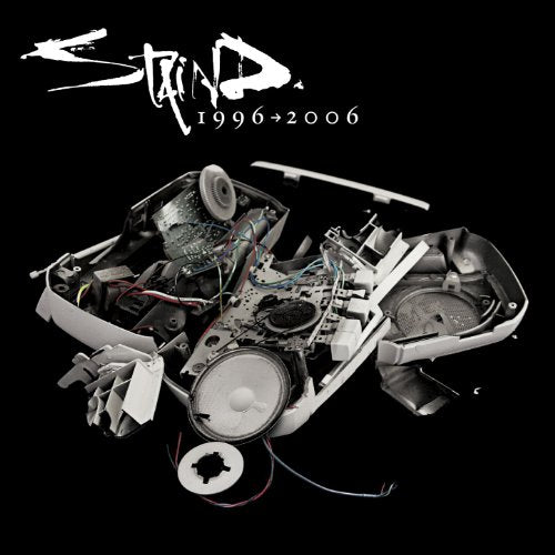 Staind album cover showing a disassembled, broken portable radio on a black background.