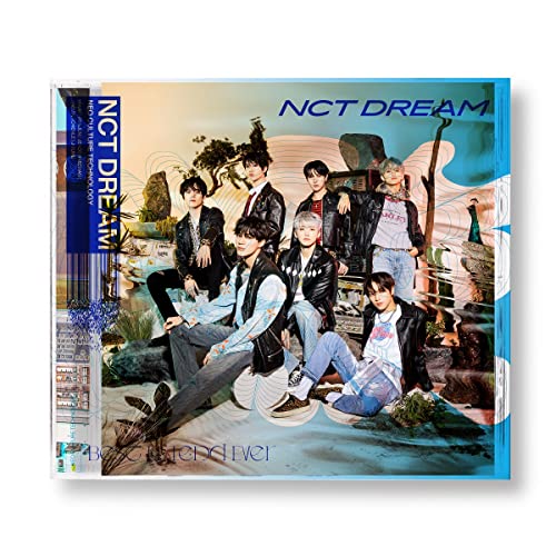 Six members of the K-pop group NCT Dream pose in a surreal, artistic landscape.