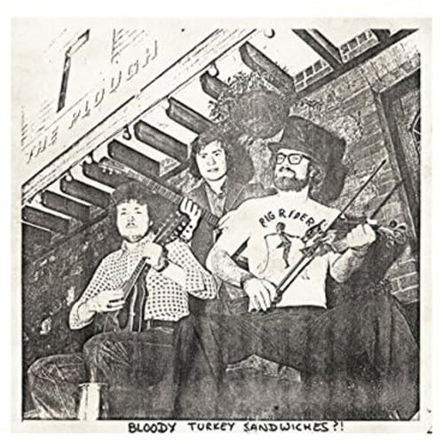 Black and white photo of three musicians with guitars, album title below.