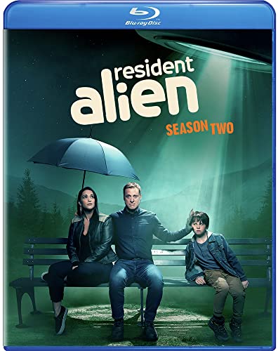 Resident Alien" Season Two Blu-ray cover with characters and an umbrella.