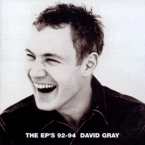 Black and white CD cover featuring a smiling David Gray portrait.