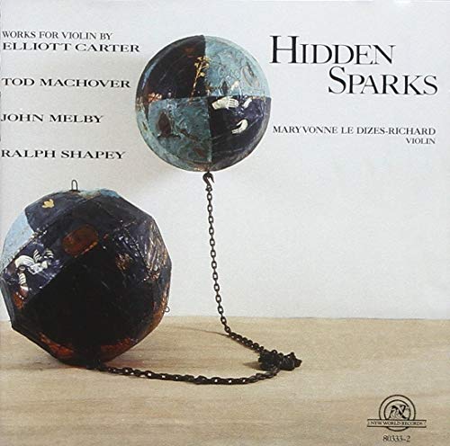 CD cover with abstract, fractured sphere imagery and text details.