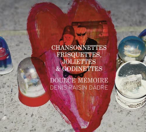 CD cover with vintage portraits, red heart shape, and snow globes.