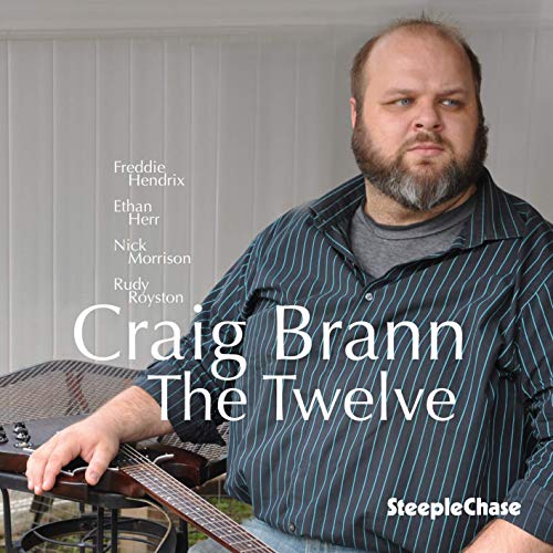 Craig Brann album cover featuring a portrait of the musician with a banjo.