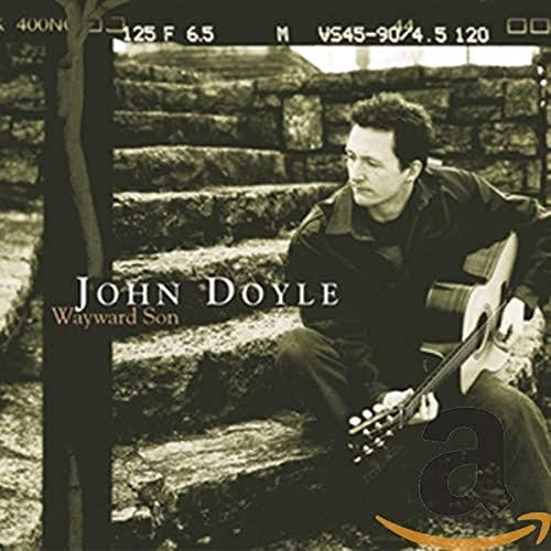 John Doyle album cover: man with guitar seated on stone steps.