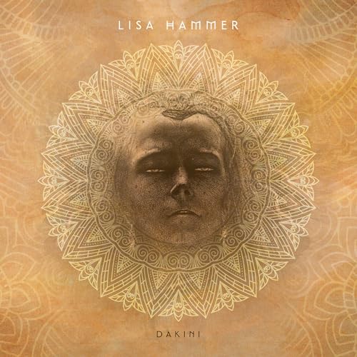 Album cover for Lisa Hammer’s “Dakini” featuring a central face with mandala design.