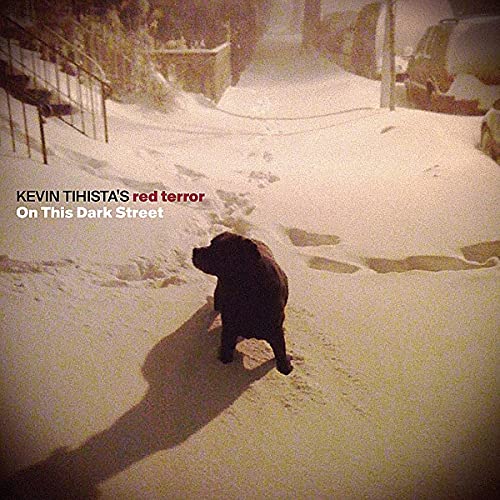 Snowy street scene with a black dog, album cover for Kevin Tihista.