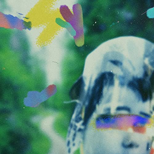 Abstract album cover with a blurred face and colorful paint splatters.