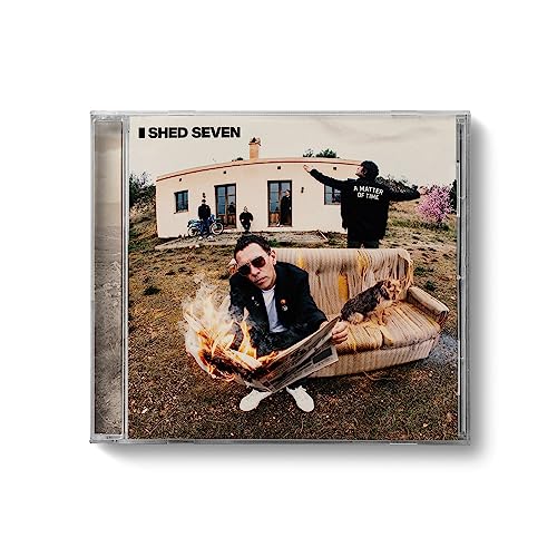 Shed Seven album cover: people and a burning sofa in a landscape.
