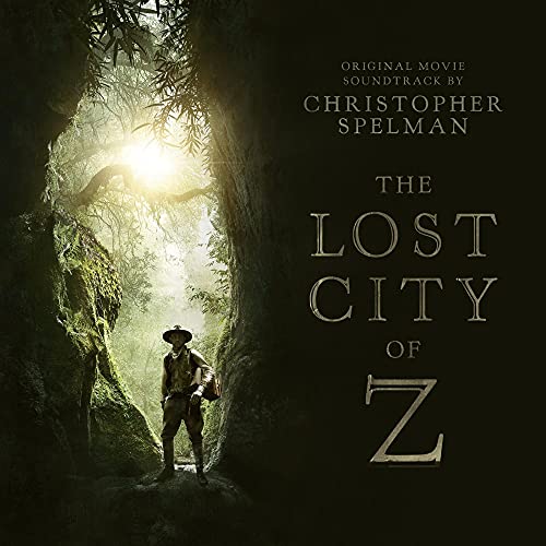 An explorer stands in a jungle clearing with text for The Lost City of Z.