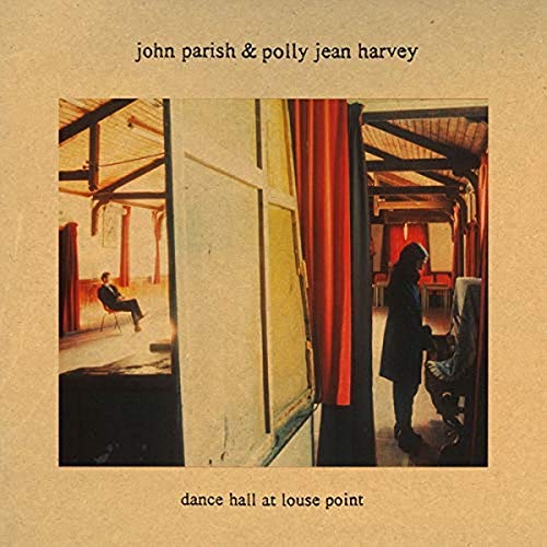 Album cover: two figures in a rustic dance hall, sepia toned.
