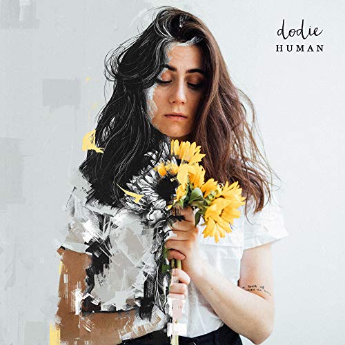 Album cover for Dodie’s “Human” featuring a woman with sunflowers.