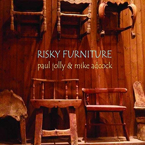 CD cover for "Risky Furniture" featuring rustic wooden chairs and text.