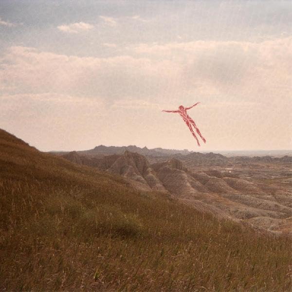 Album cover: red, wireframe figure flying over a brown, hilly landscape.