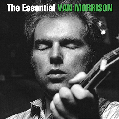 Black and white close-up of Van Morrison playing guitar with his eyes closed.