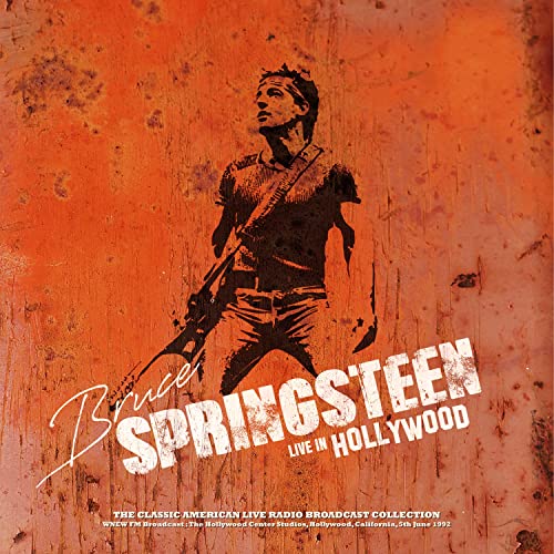 Bruce Springsteen album cover: textured orange background with a silhouetted musician.