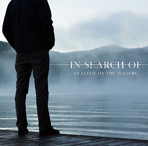 Man looking at misty water, album cover for "An Elegy On The Waters".