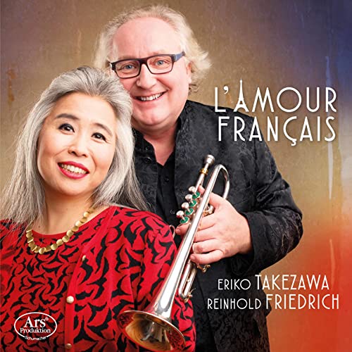 CD cover featuring two musicians, a trumpet, and text “L’Amour Français”.