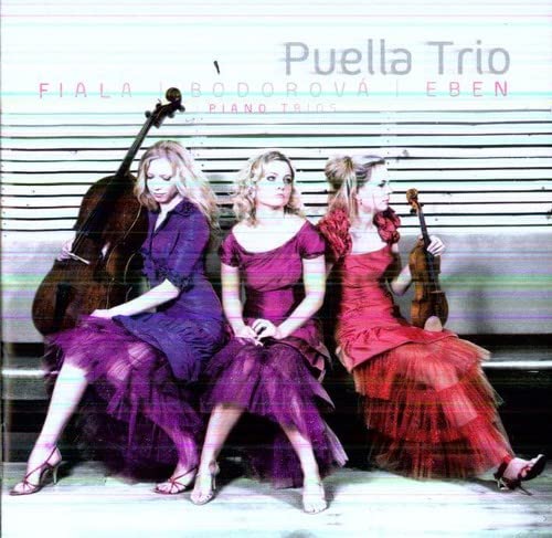 Three women with string instruments seated on a wooden bench.