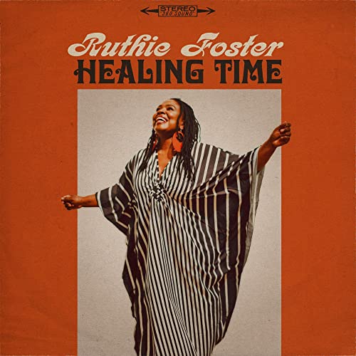 Ruthie Foster album cover: portrait of a smiling woman with outstretched arms.