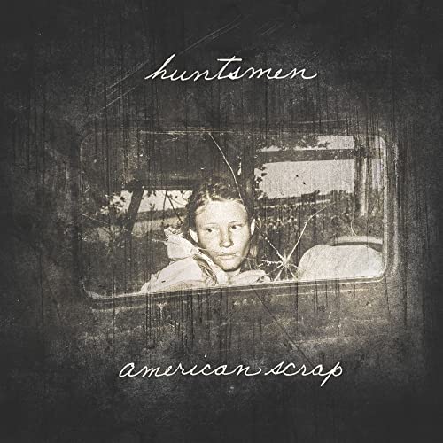 CD cover for Huntsmen’s “American Scrap” featuring a cracked window portrait.