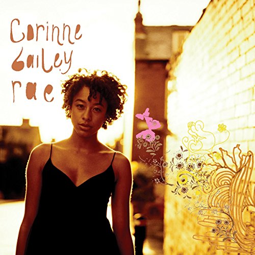 CD cover featuring Corinne Bailey Rae, floral designs, and a brick wall.