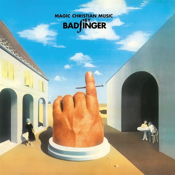 Badfinger’s “Magic Christian Music” album cover: surrealist painting of a hand and arches.