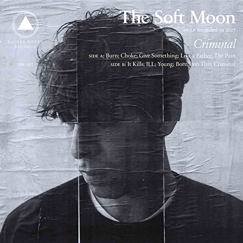 Black and white album cover for The Soft Moon’s “Criminal” with obscured face.
