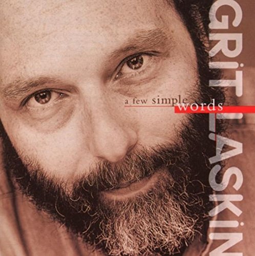 CD cover featuring a close-up portrait of a bearded man, Grit Laskin.