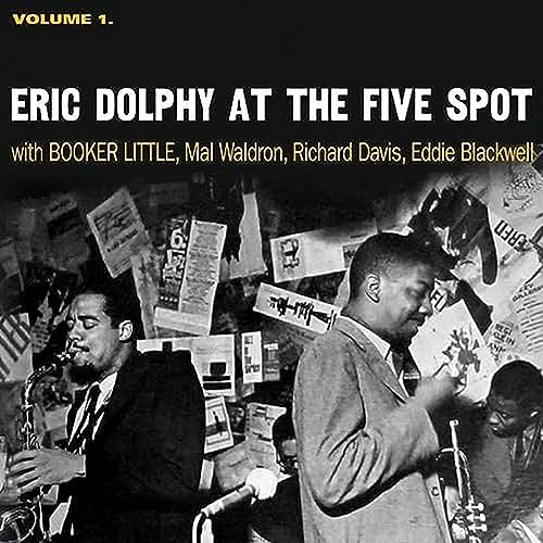 Eric Dolphy playing saxophone at The Five Spot, black and white photo.